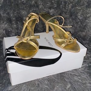 Gold strapped heels